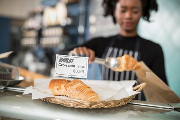 In-store food label on croissants showing price reduction